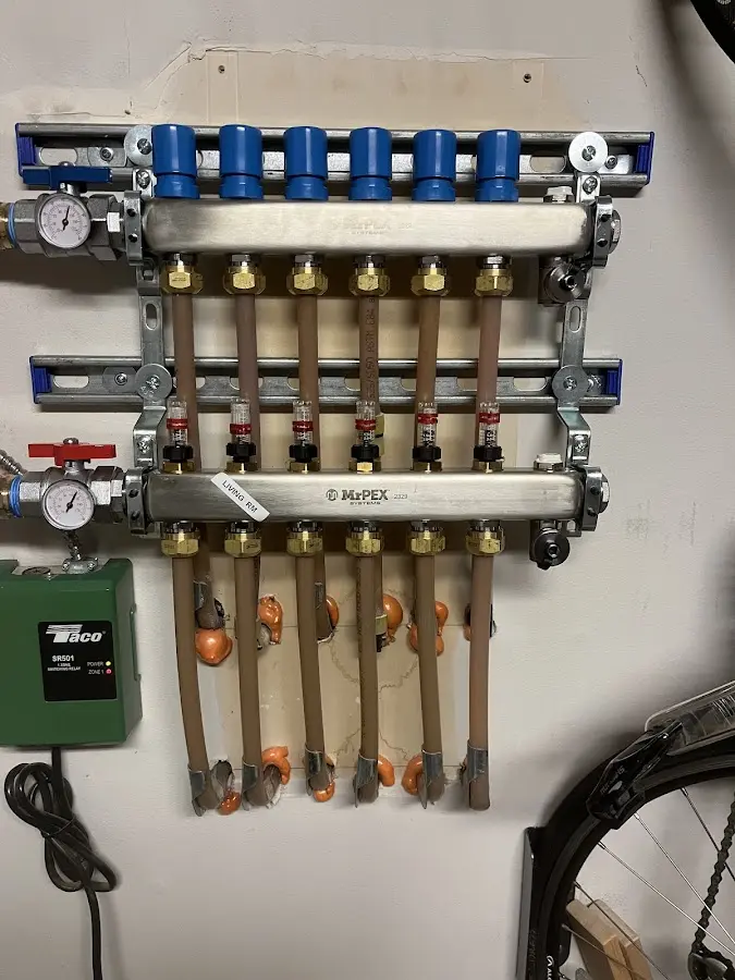 Plumber performing Water Heater Repair at a residential property in West Lake Hills